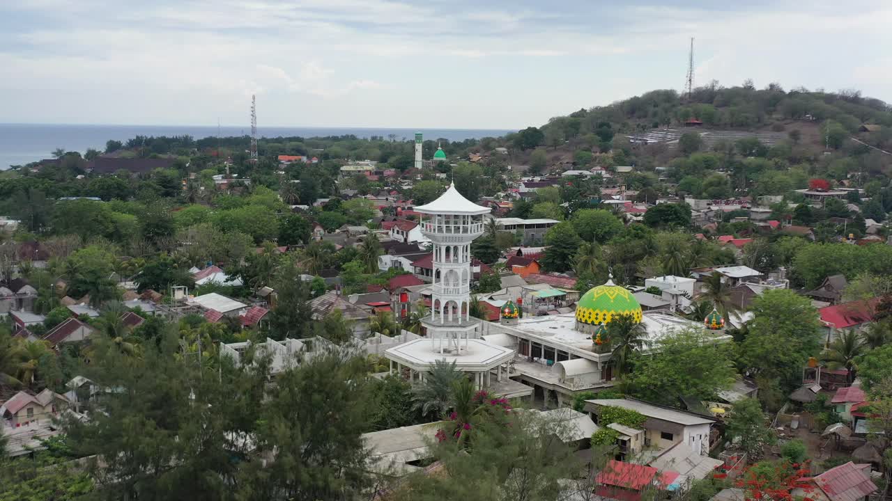 aerial of white mosque tower on local Gili Trawangan Island around Bali Indonesia