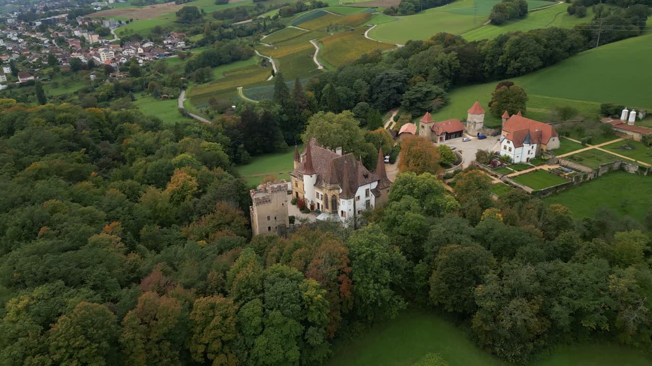 Push in drone shot of Gorgier Castle in Canton of Neuchatel Switzerland