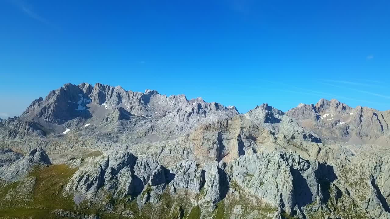 Aerial ballet above Picos de Europa: Rugged summits paint an awe-inspiring portrait
