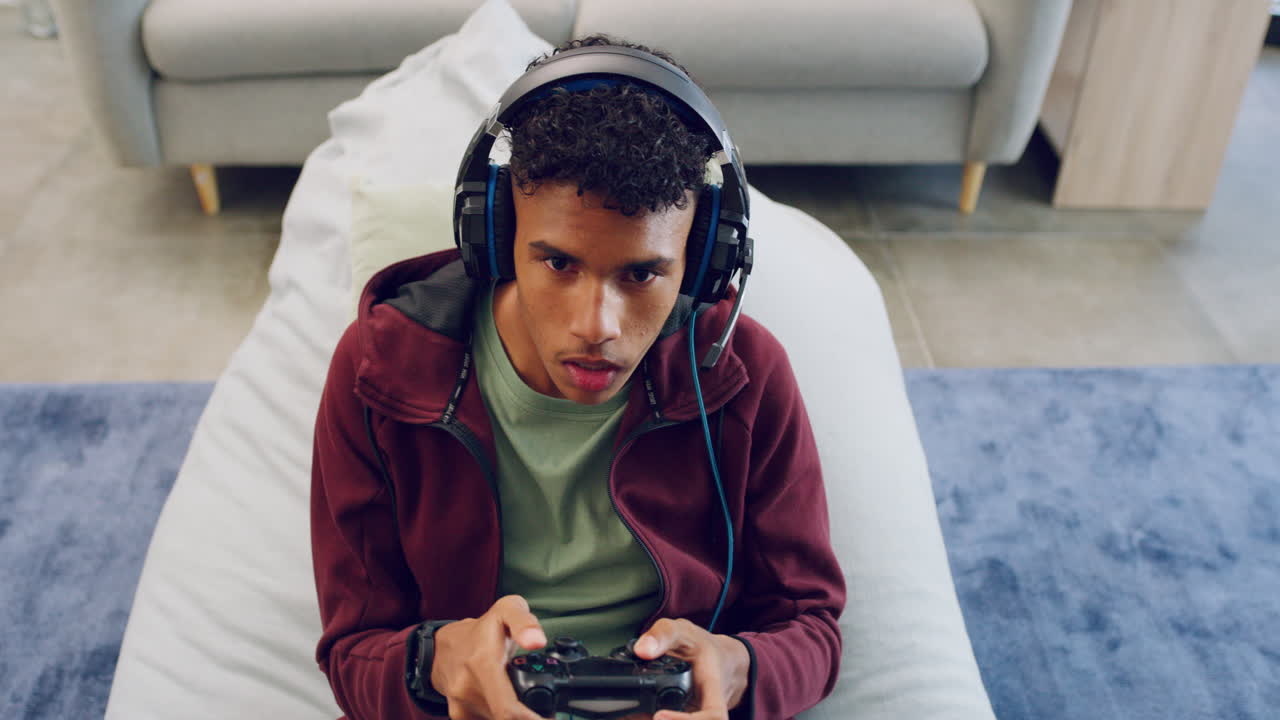 Young gamer wearing a wireless headset