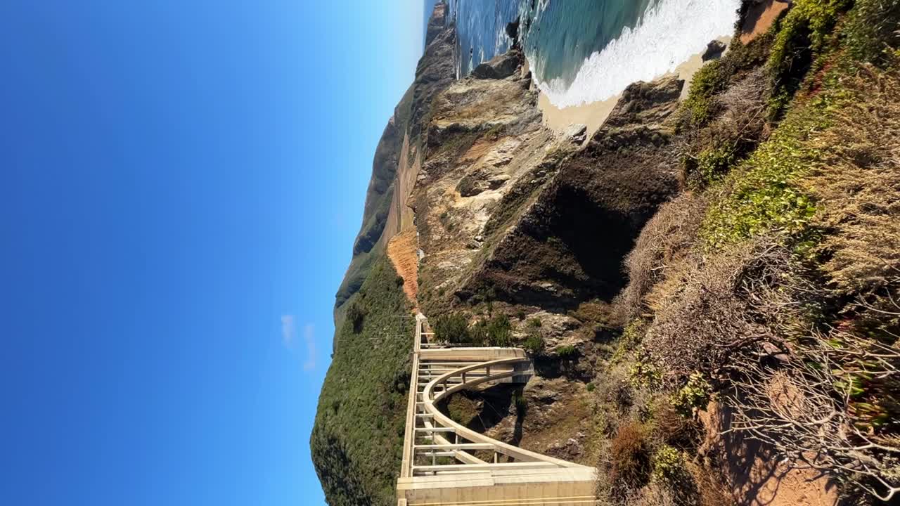 Big sur bridge and incredible coastal mountains. Sunny day on the Pacific Ocean coast.