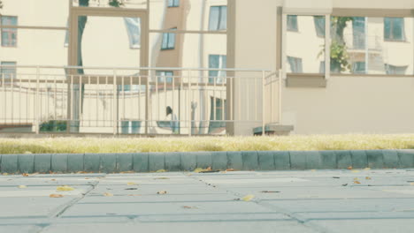 urban outdoor scene with skateboarder and buildings