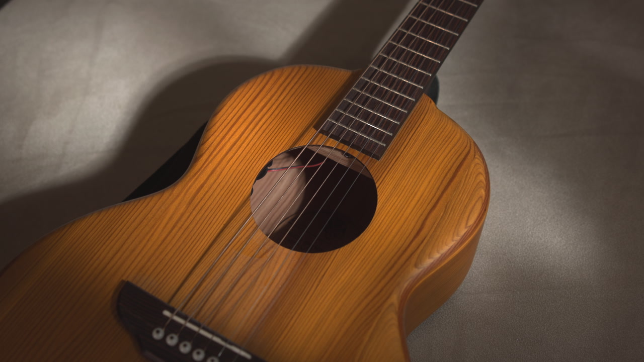 Topview Acoustic Guitar Soundhole And Bridge, Golden Warm Lighting, Detailed Wood Grain, Close Focus . Media