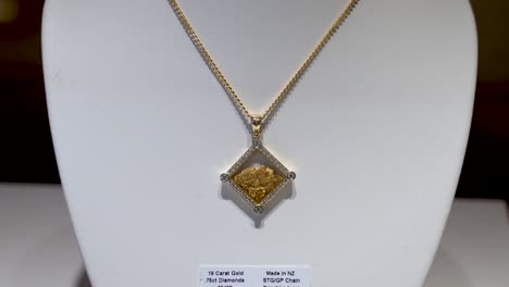 new zealand gold necklace in a gold shop in arrowtown in central otago - tilt down