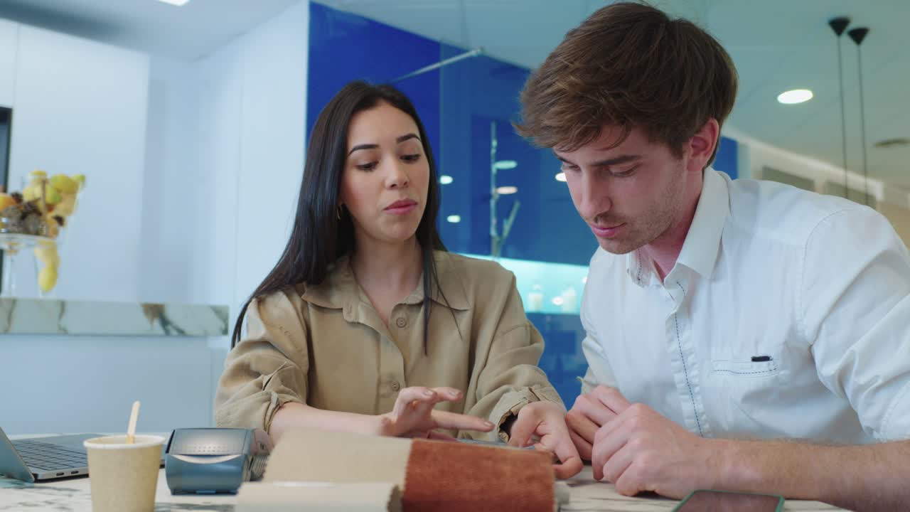 Business Meeting with Fabric Samples