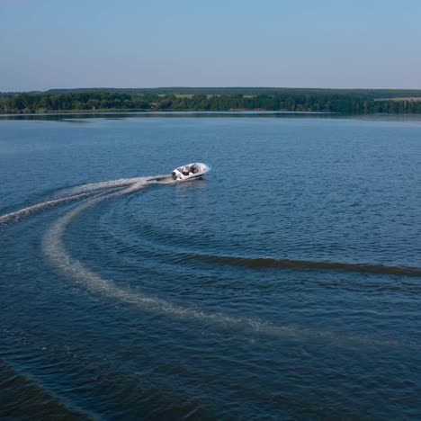motor boat travels along river