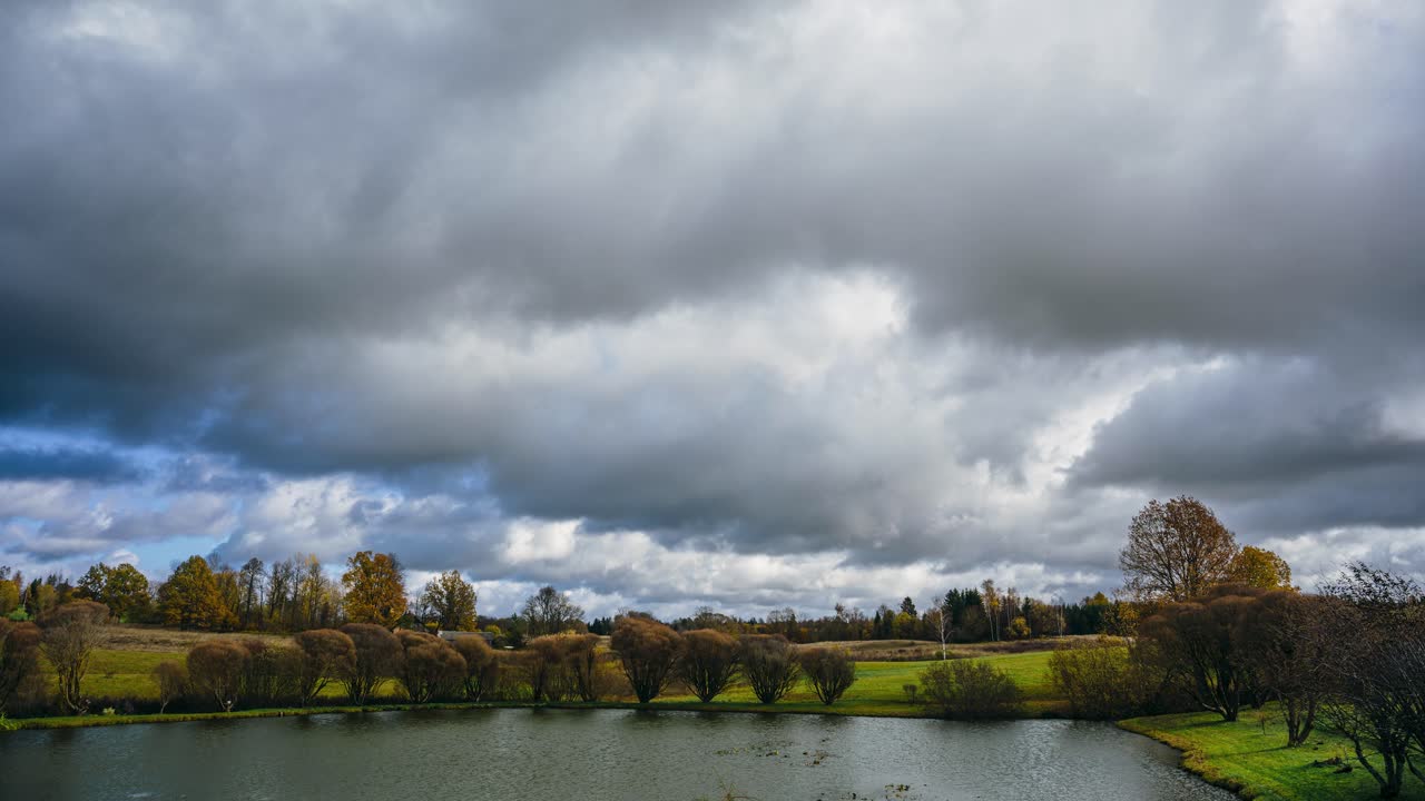 Nature timelapse in countryside. Autumn season of rural landscape in Latvia.