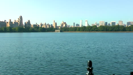 pan, central park, manhattan, new york lake view with cityscape