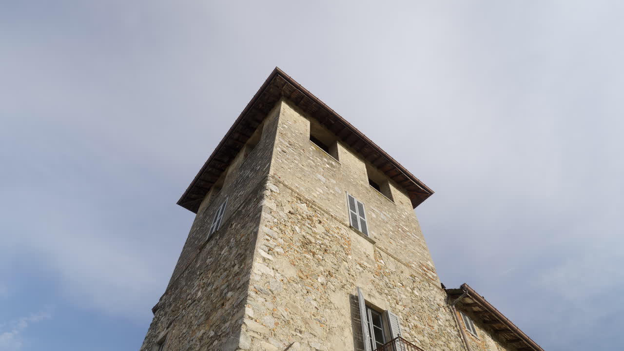 Stone Tower Against a Cloudy Sky