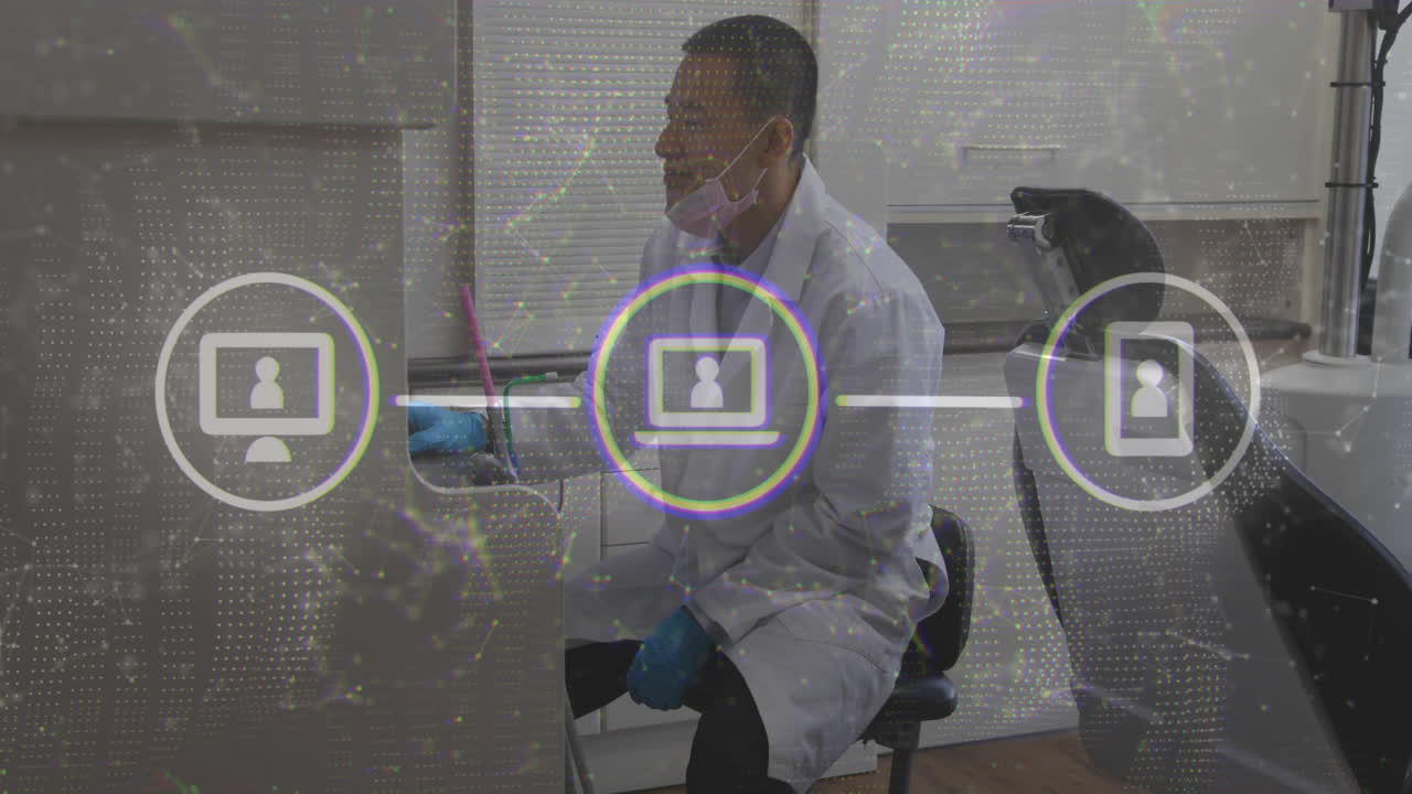 Animation of network of connections with icons over biracial male dentist using computer