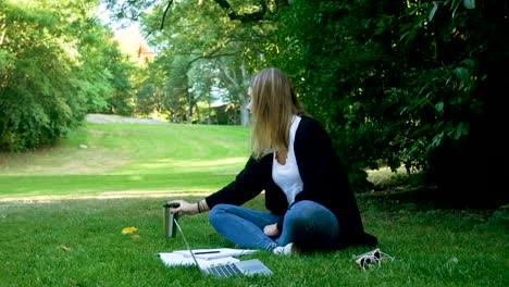 girl studying in a park