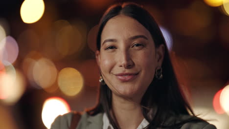 face, night and woman in a city