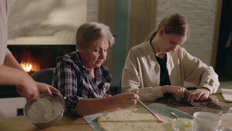 grandmother and granddaughter baking together