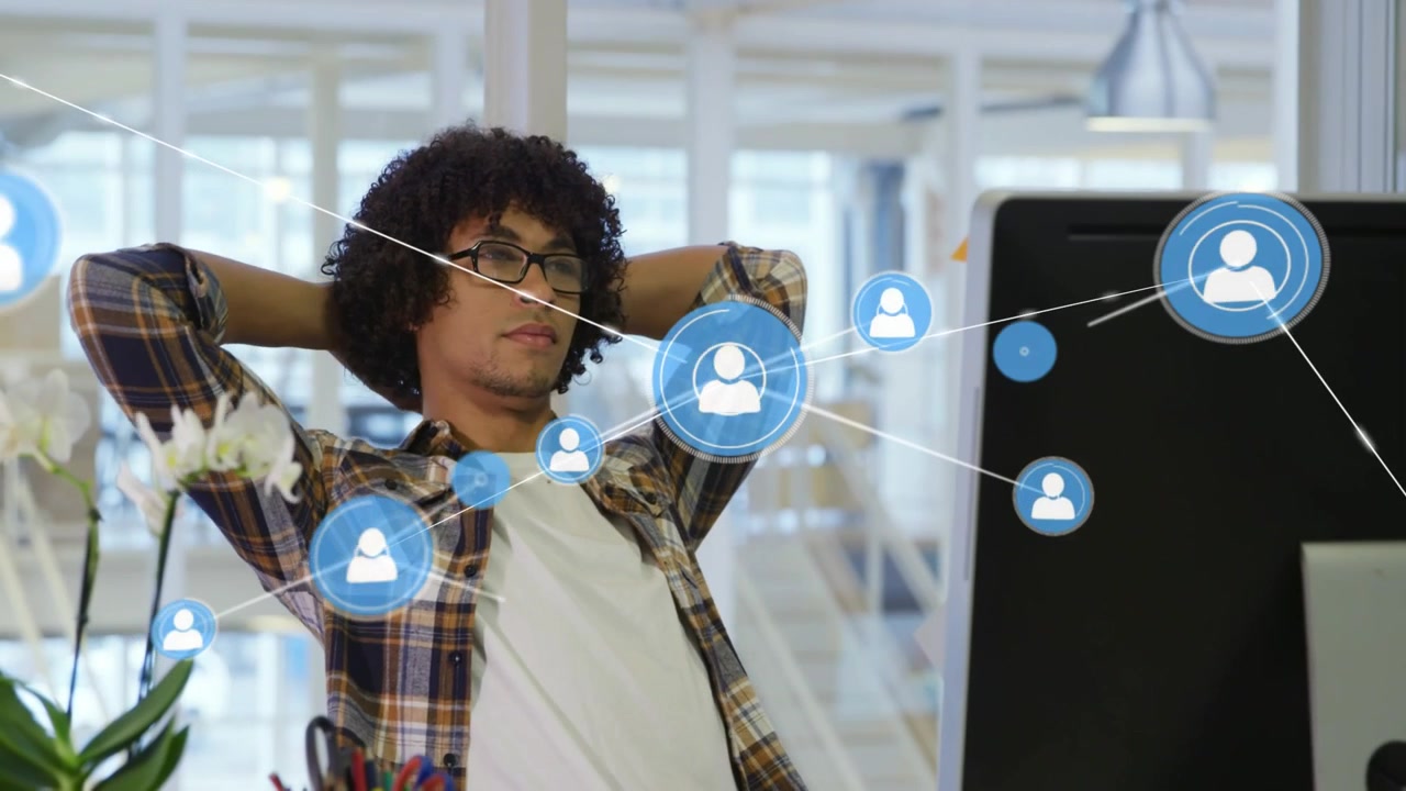 Male office worker reacting to data icon, interacting with expanding technology visuals for data