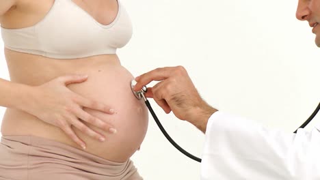 Close-up-of-gynecologist-examining-a-pregnant-woman