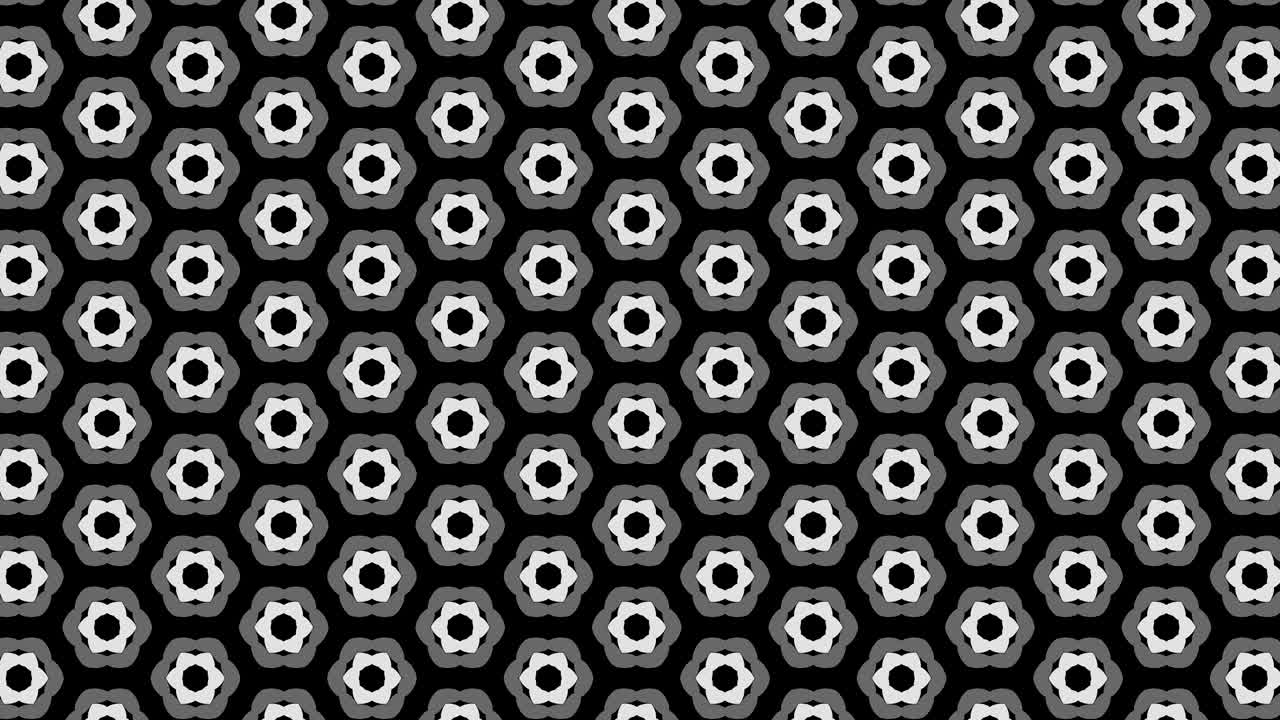 2D graphic video pattern that moves to the lower right with zoom, composed of designs and shapes with multicolored textures.