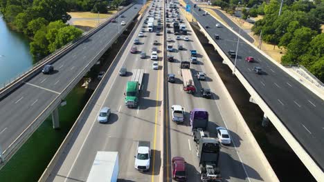 Drone-footage-remains-still-in-the-air-while-rush-hour-traffic-passes-underneath