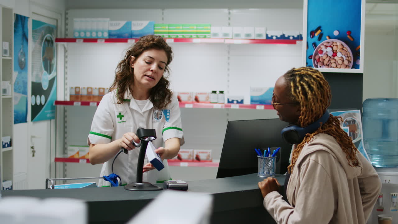 Customers interacting with pharmacists in a pharmacy
