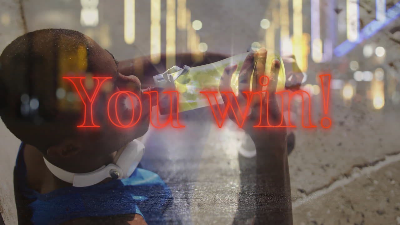 mid adult man drinking water bottle on nighttime street, displaying neon-red You win health graphic