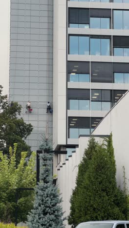 building cleaning crew on high-rise