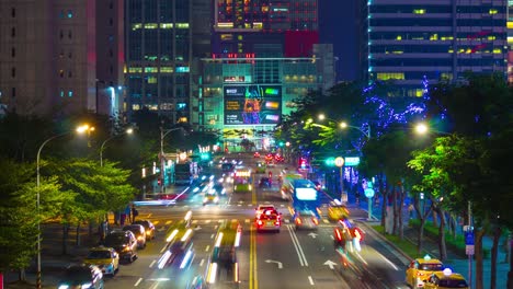 night illuminated taipei city center traffic street rooftop panorama 4k time lapse taiwan