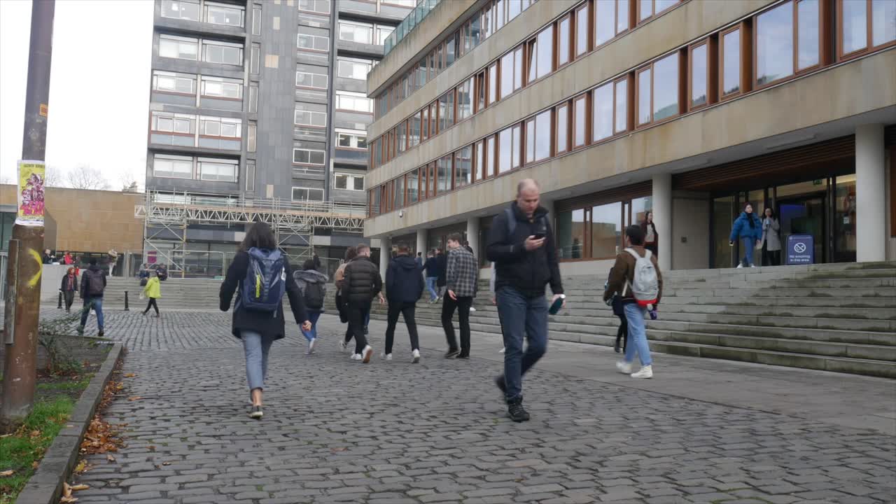 Time Lapse of Busy Urban Scene Outside University Building in Edinburgh