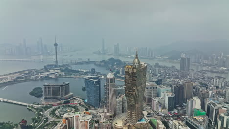 an aerial view of a city with tall buildings