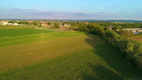 Aerial-View-of-Farmlands-and-an-Amish-Cemertery-on-a-Beautiful-Sunny-Day