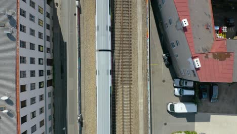 Top-Down-Aerial-View-of-Subway-Train-in-Vienna,-Austria