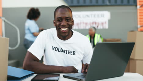 man, volunteering and computer for online