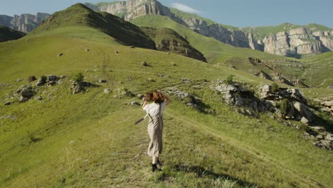 woman hiking in mountain valley