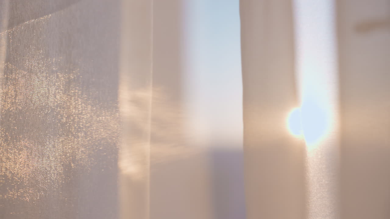 Morning Light Ambiance, Gentle Sunrise With Floating Particles, Soft Glow Through Textured Curtains At Dawn, Sunrise Filters Softly Across Textured Fabric Curtain With Dust Motes And Subtle Bokeh