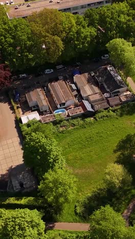 aerial view of a residential park with mobile homes and greenery