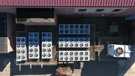 many air condenser air conditioner units at commercial building