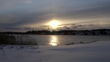 Landscape-on-snow-lake-and-village