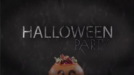 Animation-Von-Halloween-Text-über-Geschnitztem-Kürbiseimer-Mit-Süßigkeiten-Auf-Schwarzem-Hintergrund