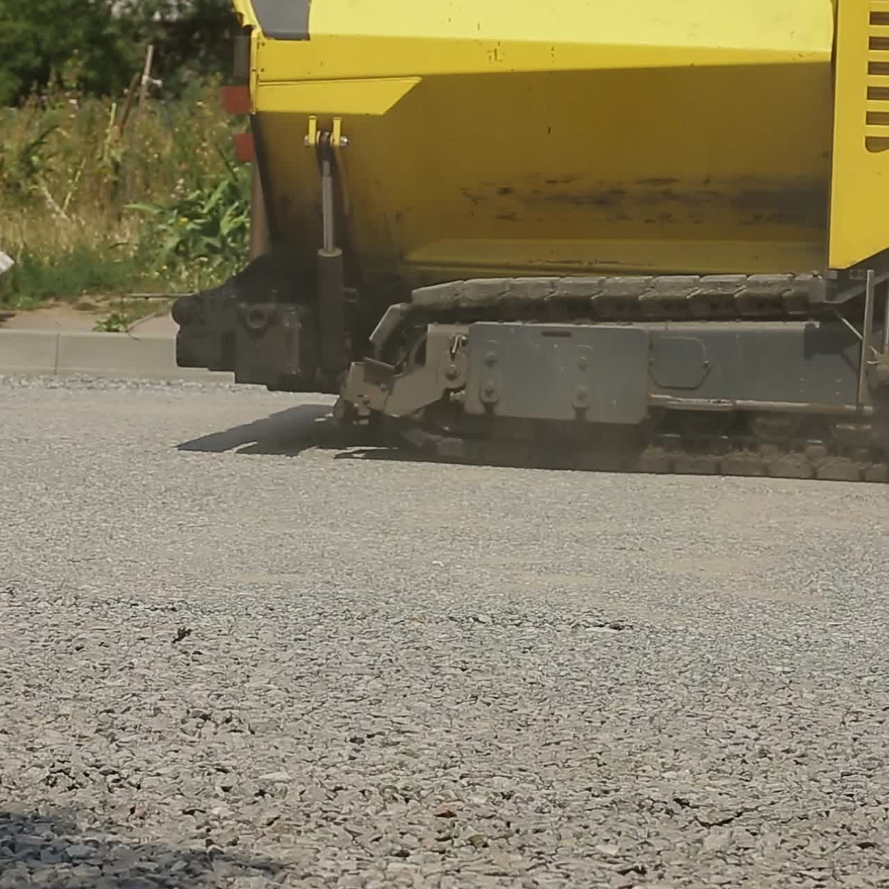 Tracked Pavers Laying Asphalt