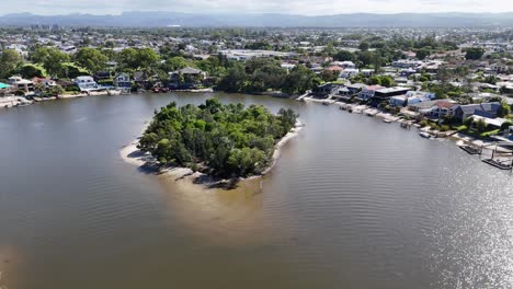 island surrounded by water and residential area