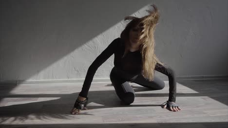 female dancer in a black outfit