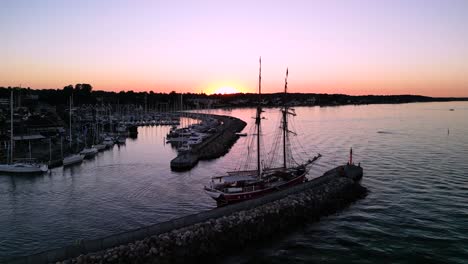 Harbor-Drone---Swimmers-Jumping-in-Sunset