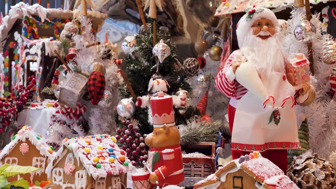 Christmas ornaments arrangement, Christmas traditions with Santa Claus, gingerbread houses, candies, toys, Christmas tree.