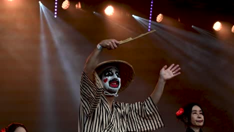 japanese clown dancing, london, united kingdom
