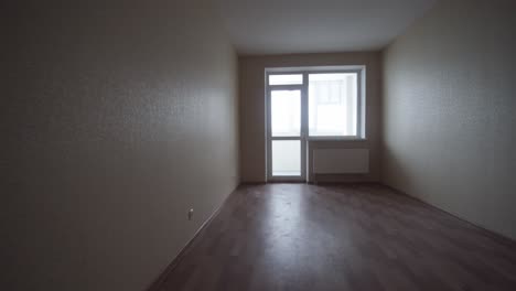 empty room with a window and door