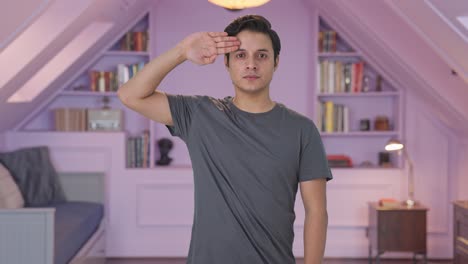 proud indian man saluting on camera