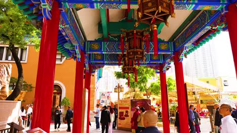 people exploring vibrant temple architecture in hong kong