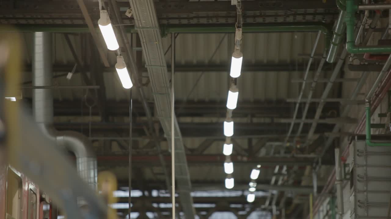 Blurry Images of a Factory Interior with Bright Fluorescent Lights