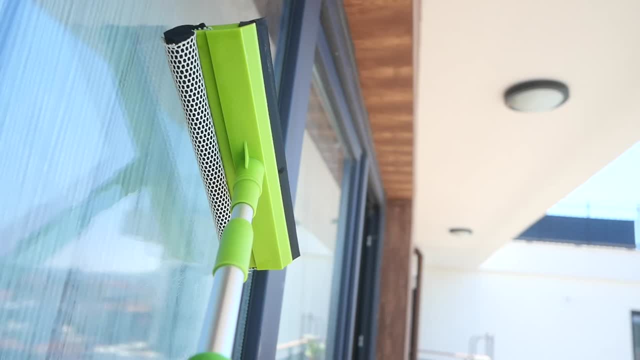 Window Cleaning with a Squeegee