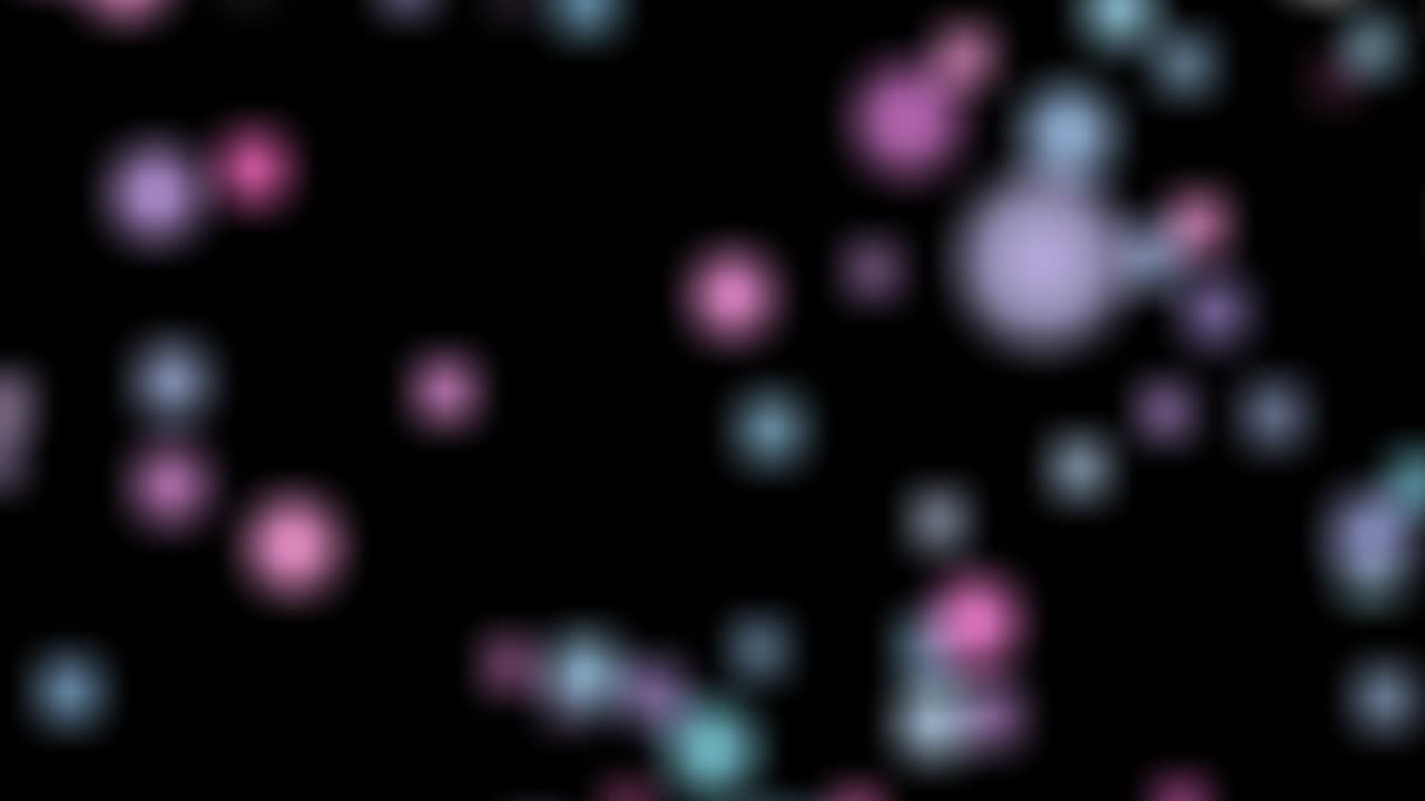 Defocused abstract multicolored bokeh lights background. Blue, purple, green, orange colors.