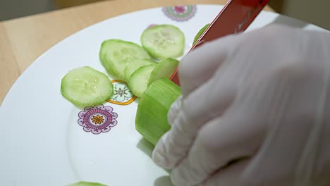 a peeled green cucumber that is sliced