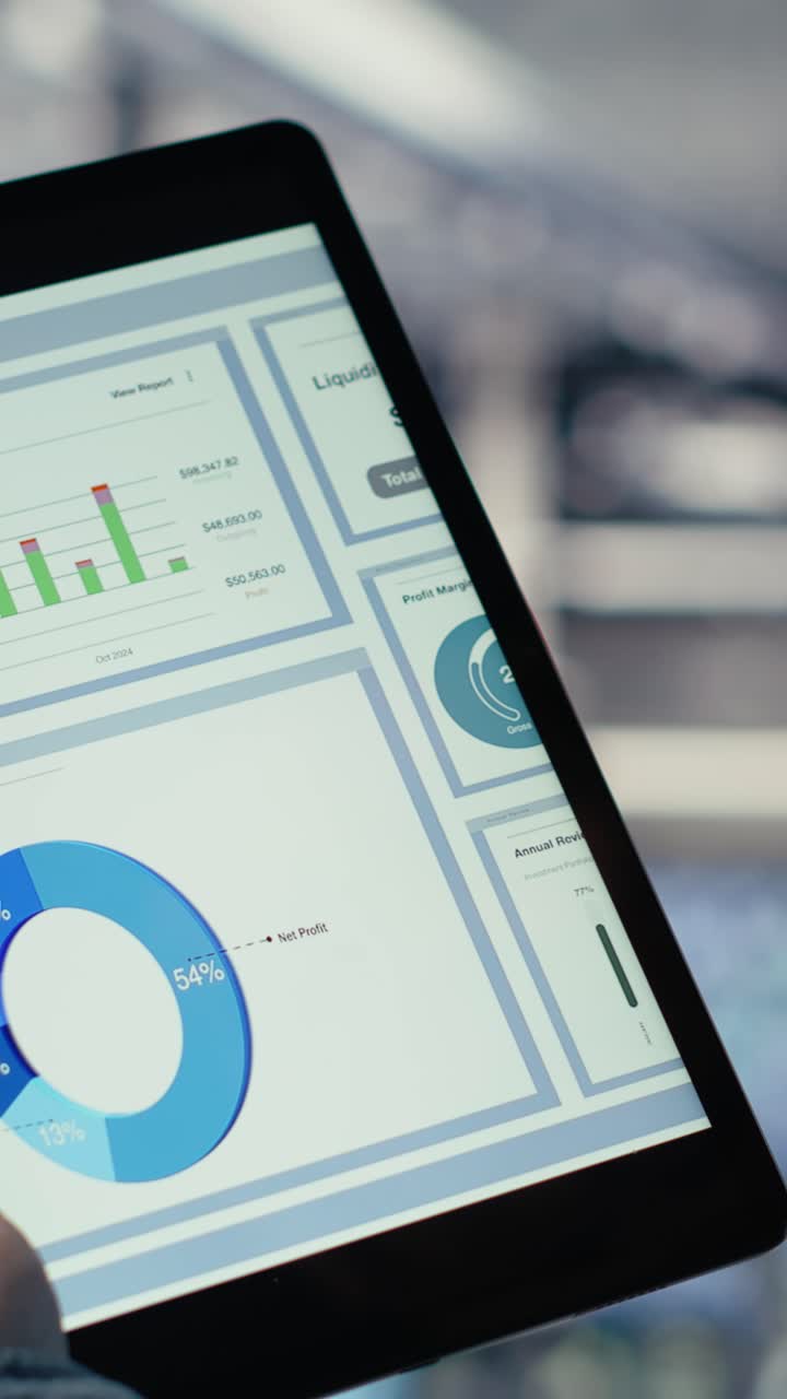 Vertical Video Close Up Of Data Center Employee Checking Infrastructure Diagnostics On Tablet